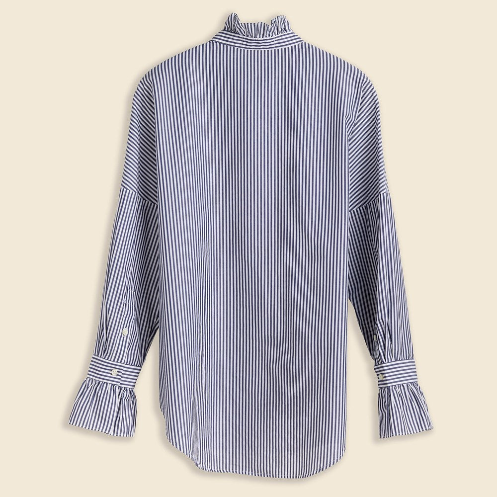 white button down ruffle blouse
